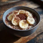 chocolate cream of rice breakfast with bananas and cocoa