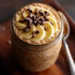 Chocolate peanut butter protein overnight oats in mason jar breakfast