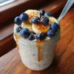 Creamy oat milk overnight oats in glass jar